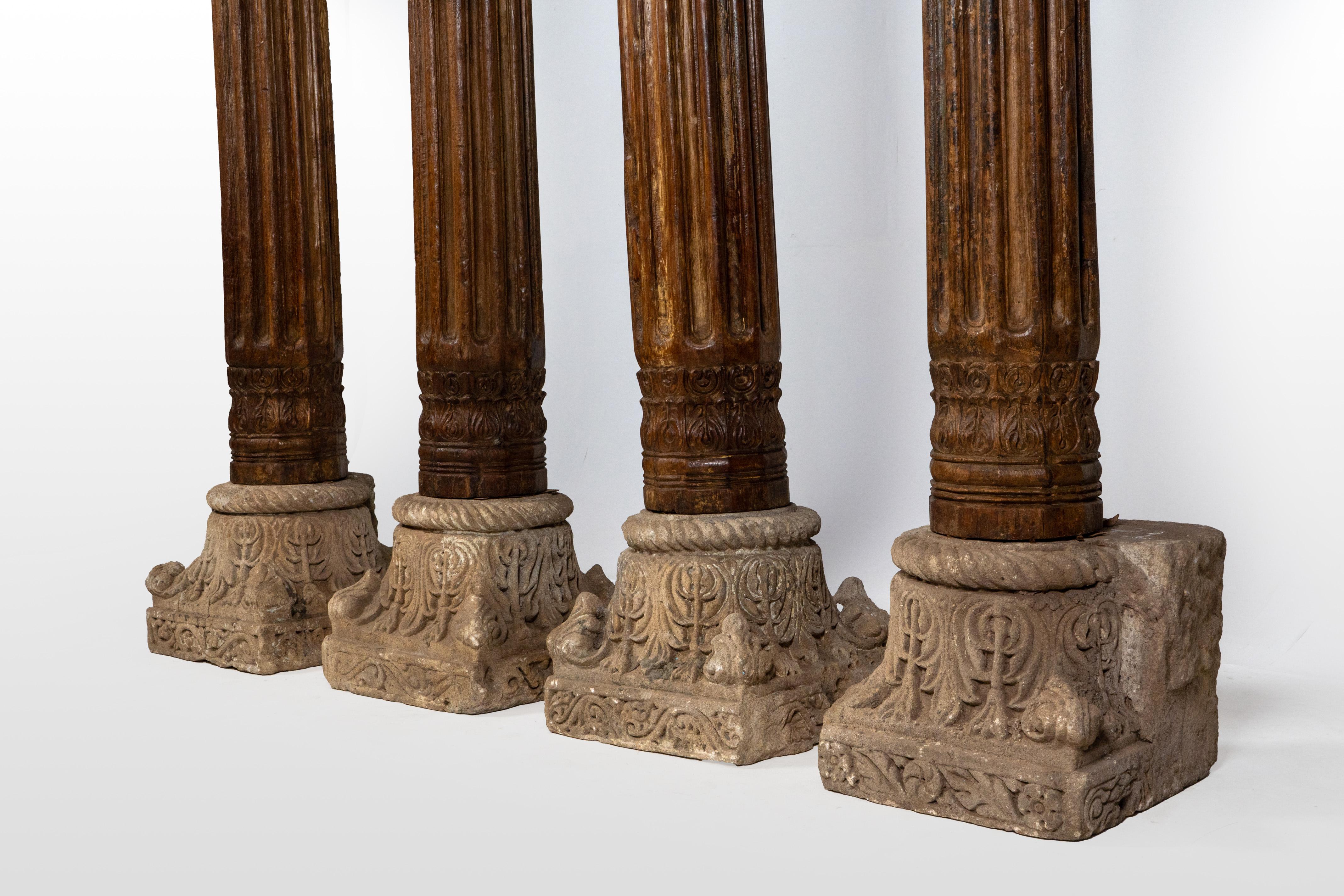 Teak A Set of Four European-Inspired Wooden Columns