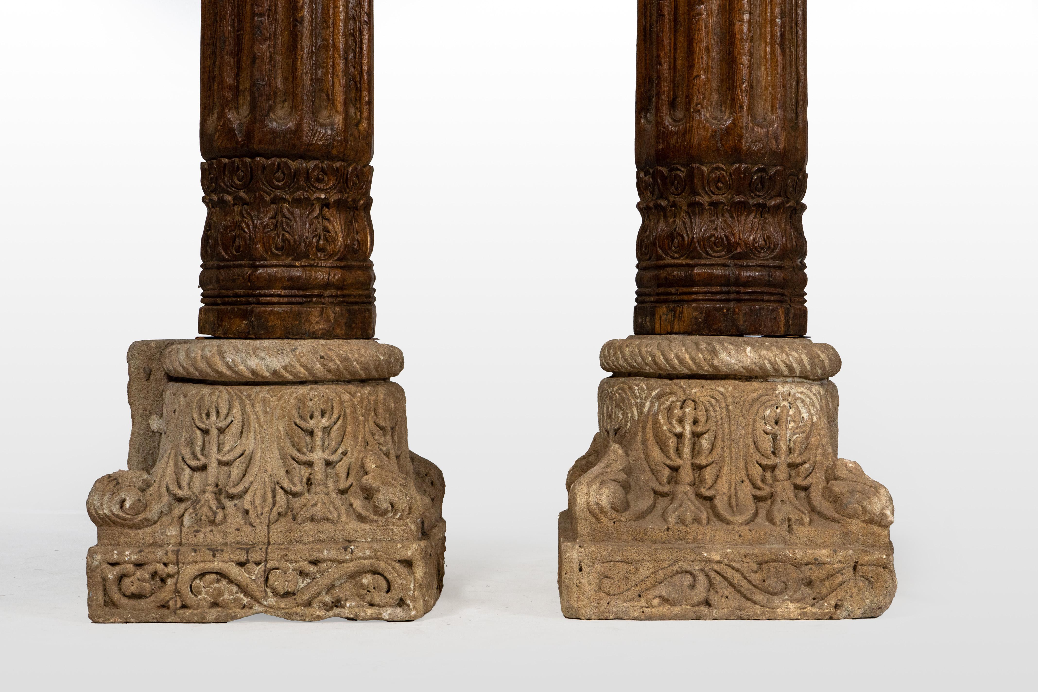 A Set of Four European-Inspired Wooden Columns 2