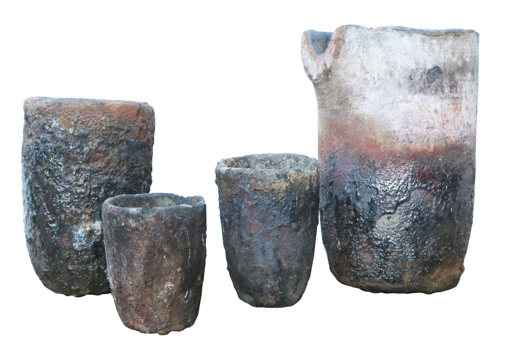 These crucibles feature exteriors encrusted with molten metals. They could be used as garden ornaments, or vases and would make a bold statement in either a traditional or contemporary setting.

Additional dimensions

Height
 50 cm
 38 cm
 26