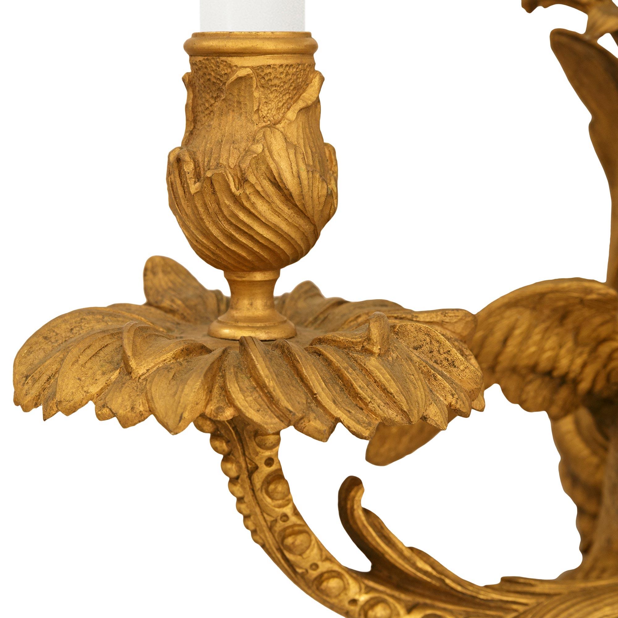 A set of four French 19th century Louis XV st. Ormolu Parrot sconces For Sale 2