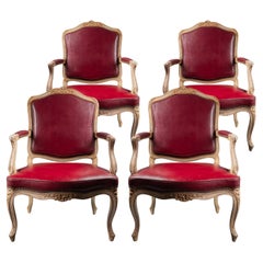 Ensemble de quatre fauteuils en bois laqué de style Louis XV du XVIIIe siècle