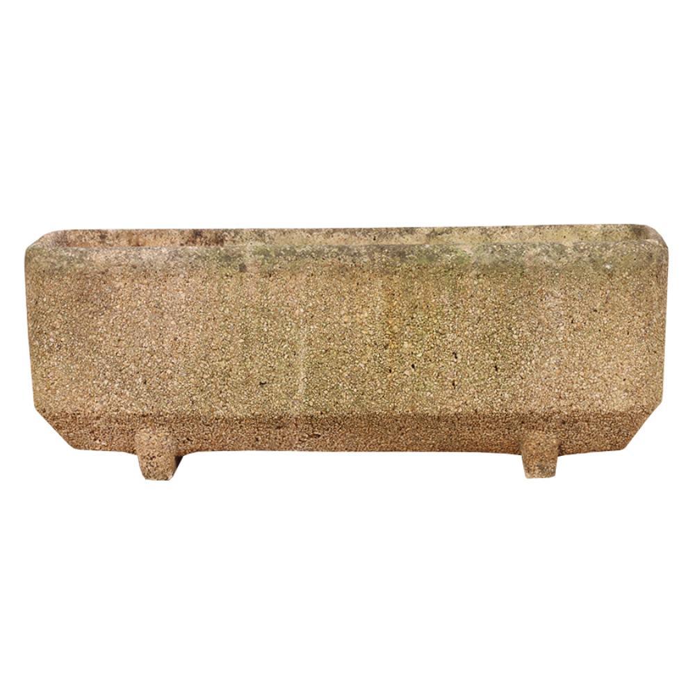 A striking set of four cast stone planters from France. Exemplifying the Modernist aesthetic, each planter features a robust geometric form with minimalist design—ideal for architectural gardens, terraces, or indoor sculptural display. The weathered