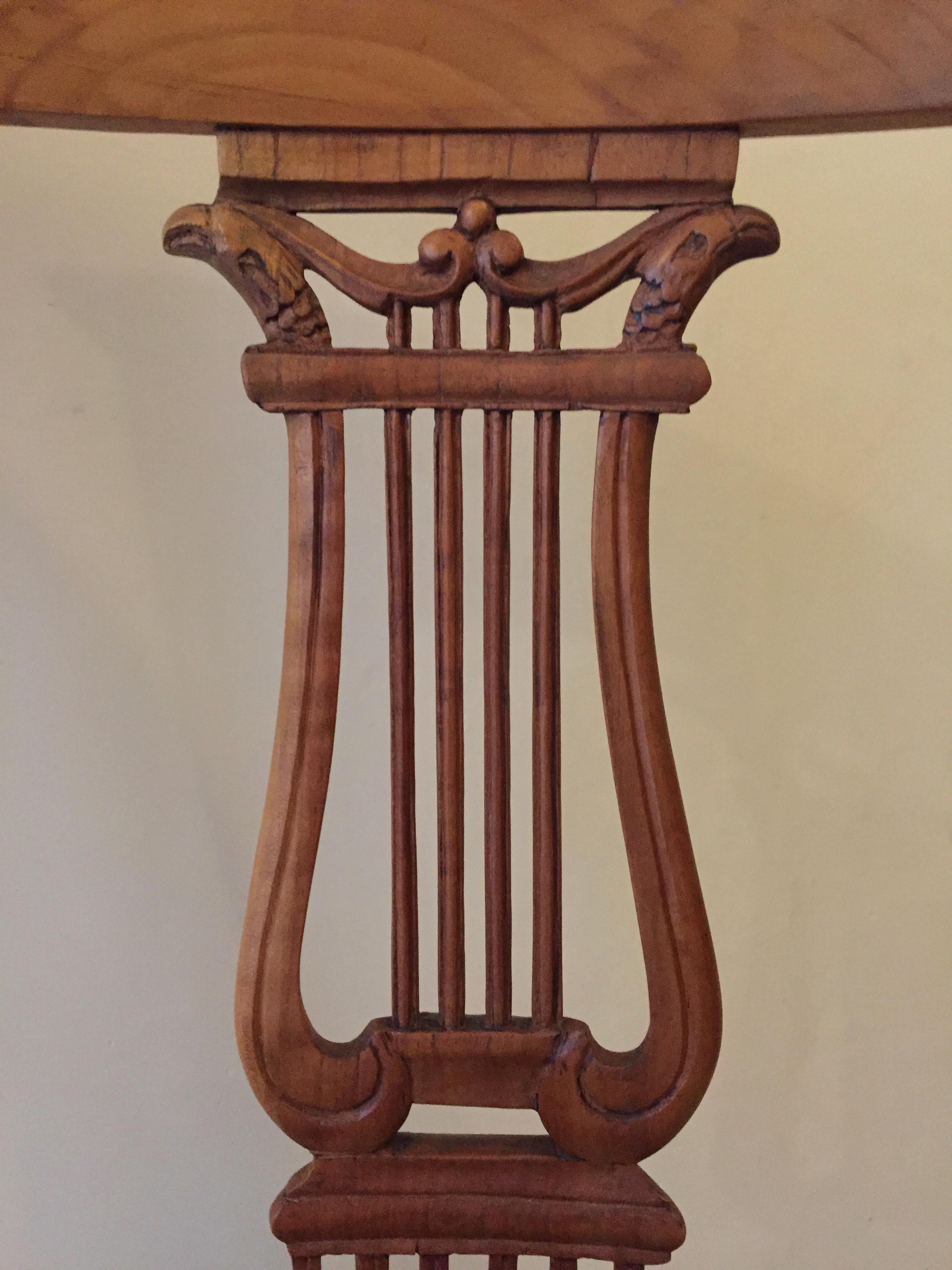 Set of Four French Neoclassical Fruitwood Lyre Back Chairs with Falcon Heads For Sale 4