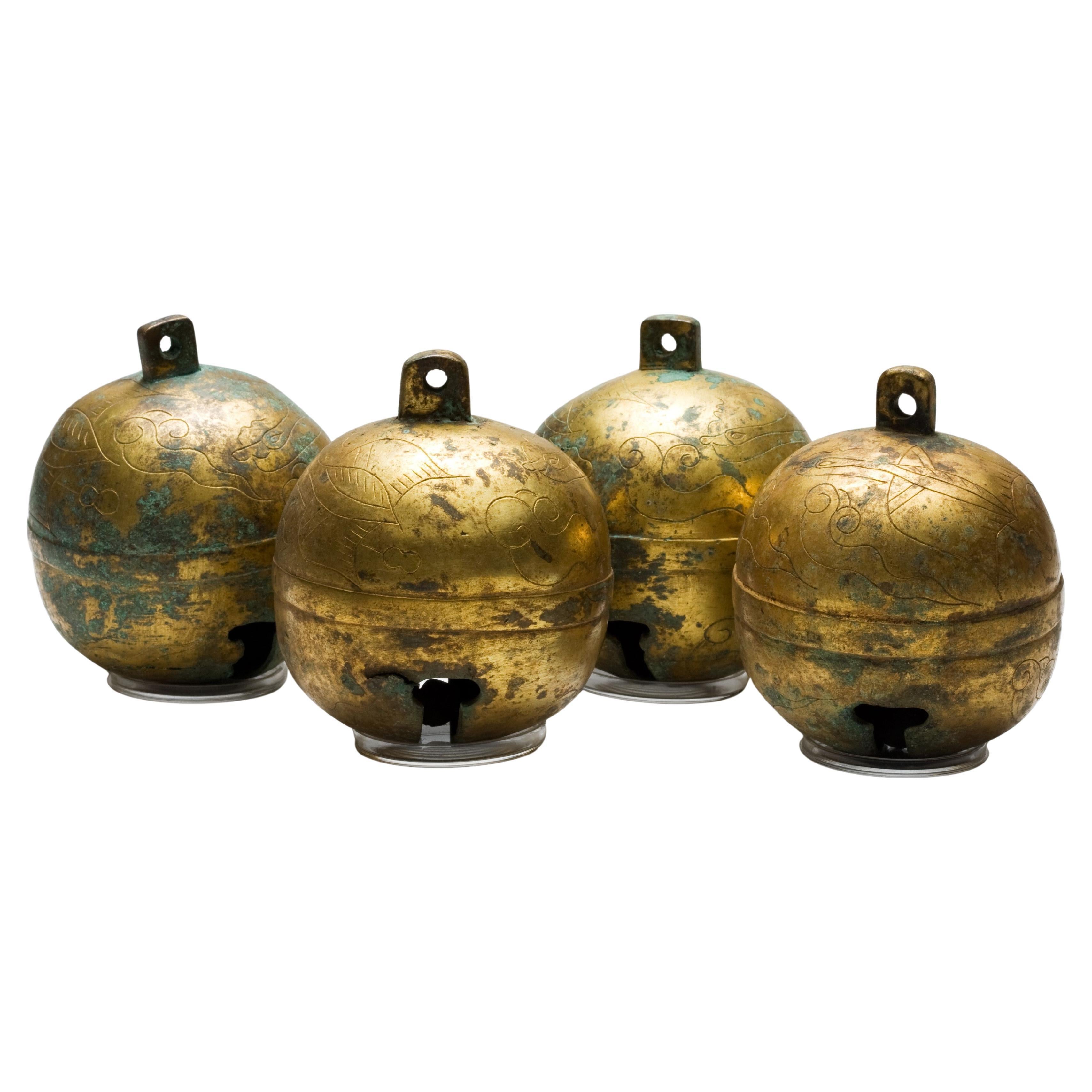 A Set of Four Gilt-Bronze Bells, Tang-Liao