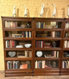 A Set Of Four Globe Wernicke Oak Bookcases- 19th Century