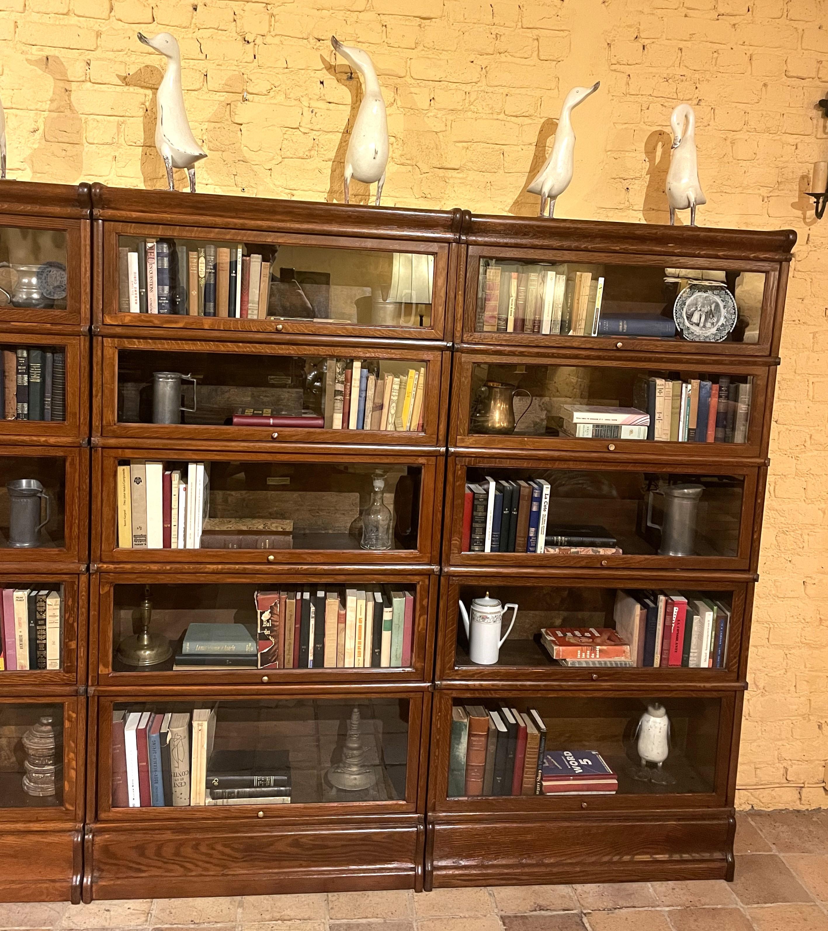 Aesthetic Movement A Set Of Four Globe Wernicke Oak Bookcases- 19th Century For Sale