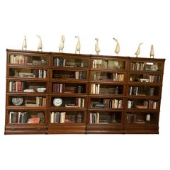 A Set Of Four Globe Wernicke Oak Bookcases- 19th Century