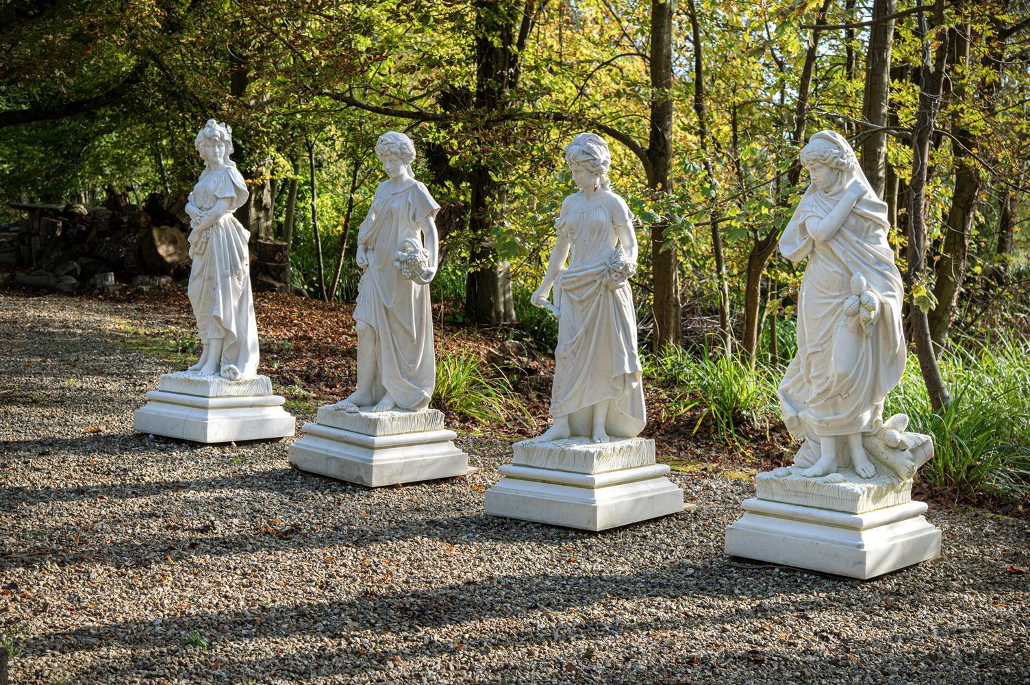 A set of four hand carved statuary marble statues depicting ‘The Four Seasons” after Carlo Nicoli
Winter wearing a cloak, Spring with flowers, Summer with sheath of corn and scythe, and Autumn with a basket of vines slight size variance

Provenance: