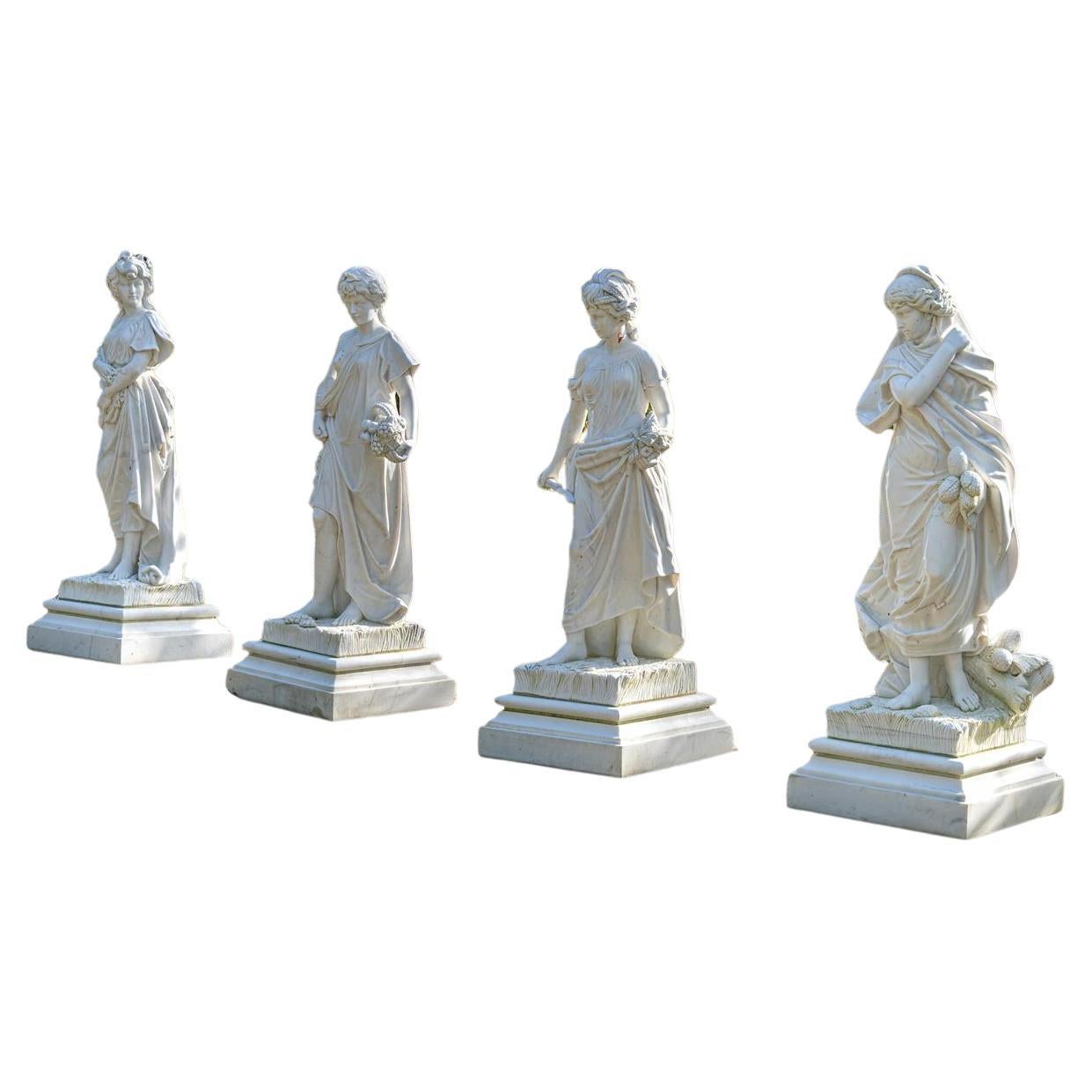 Ensemble de quatre statues en marbre sculpté à la main représentant "The Four Seasons".