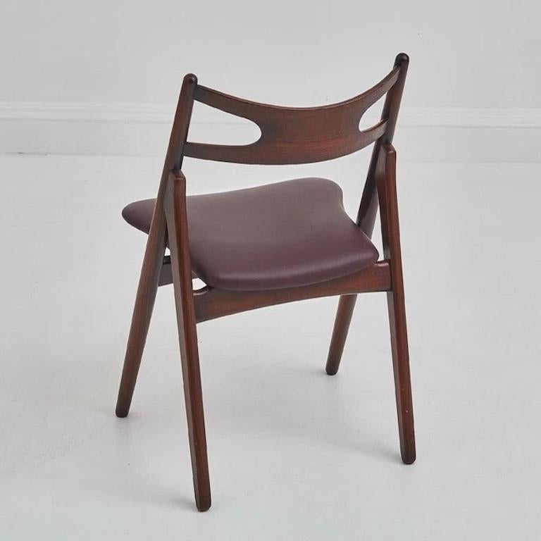 Mid-Century Modern A Set Of Four Hans Wegner 'Sawbuck' CH 29 Dining Chairs For Sale