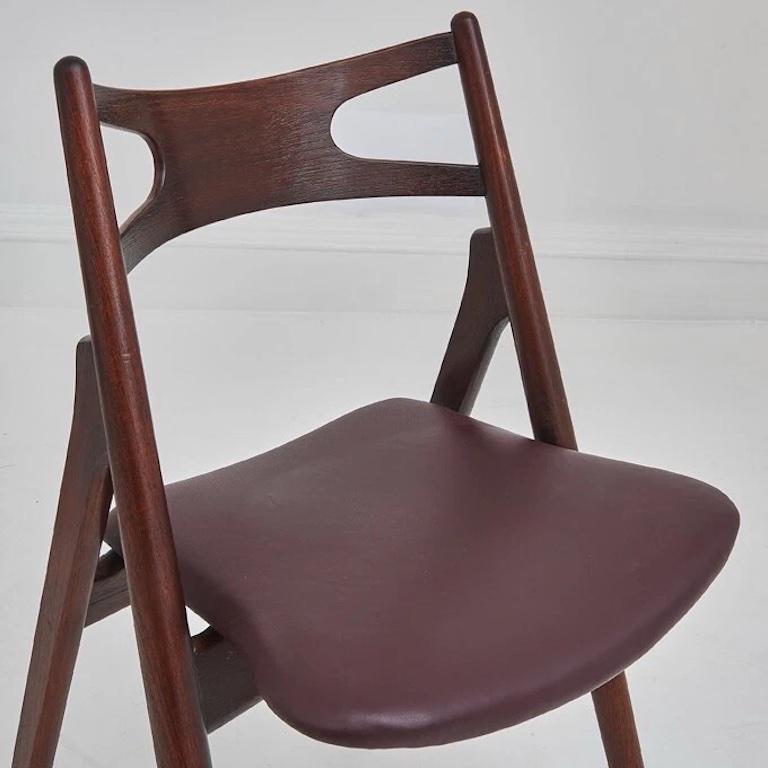 A Set Of Four Hans Wegner 'Sawbuck' CH 29 Dining Chairs In Good Condition For Sale In London, GB