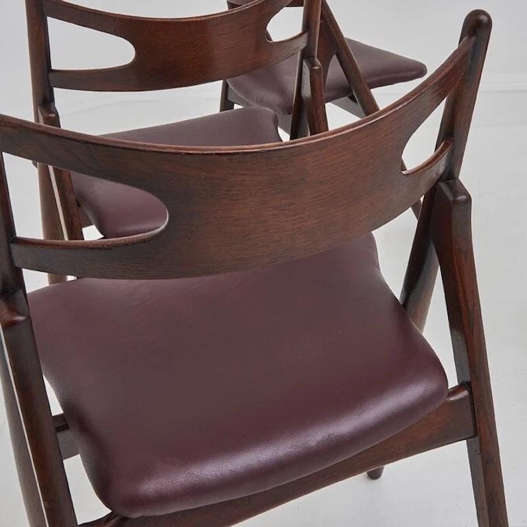 20th Century A Set Of Four Hans Wegner 'Sawbuck' CH 29 Dining Chairs For Sale