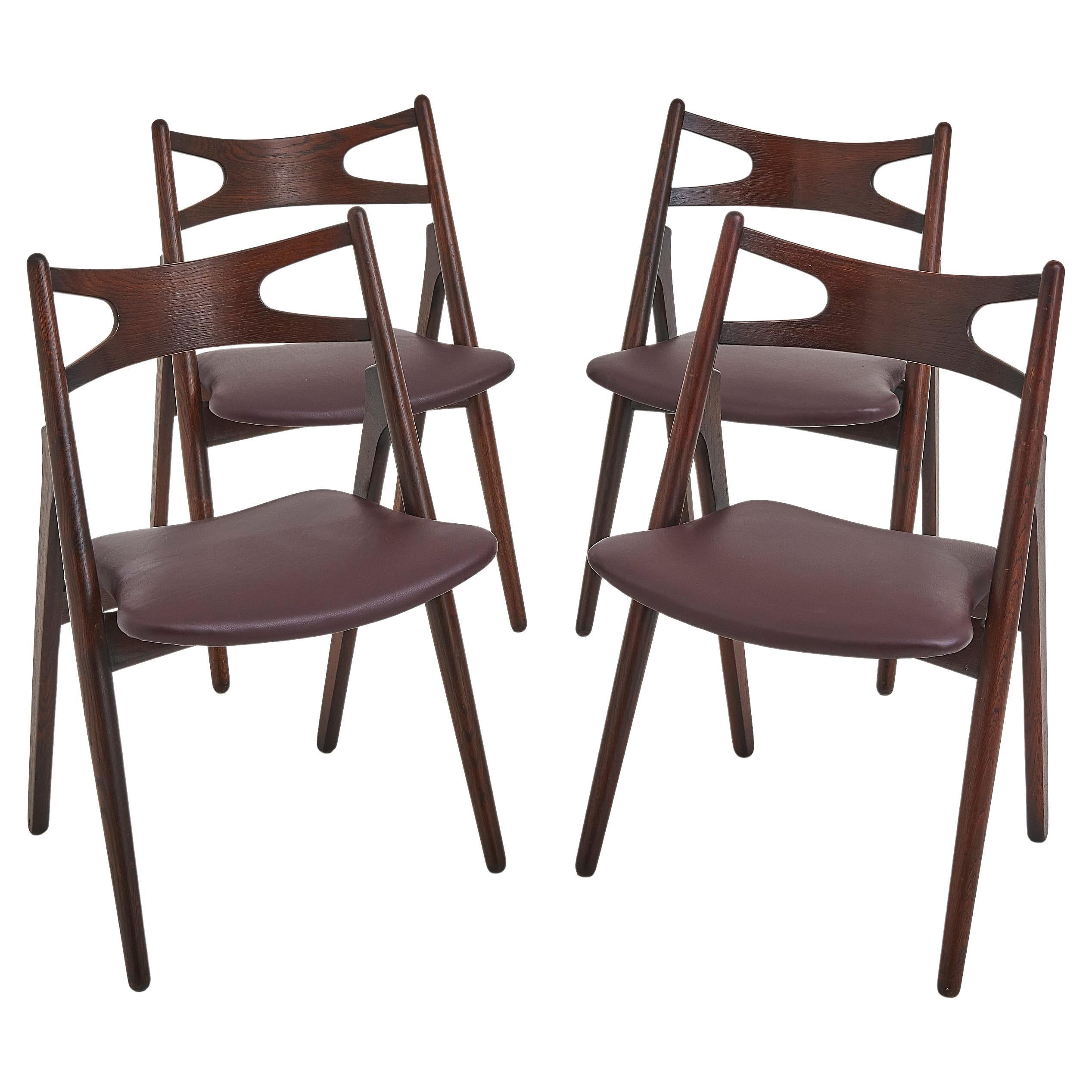 Ensemble de quatre chaises de salle à manger Hans Wegner "Sawbuck" CH 29