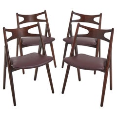 A Set Of Four Hans Wegner 'Sawbuck' CH 29 Dining Chairs