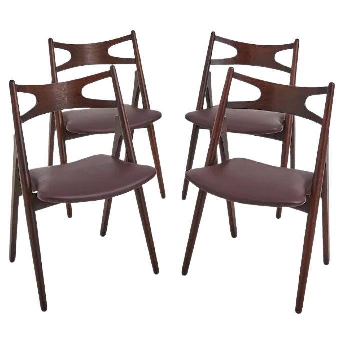 A Set Of Four Hans Wegner 'Sawbuck' CH 29 Dining Chairs For Sale