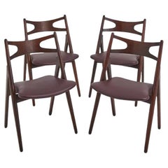 A Set Of Four Hans Wegner 'Sawbuck' CH 29 Dining Chairs