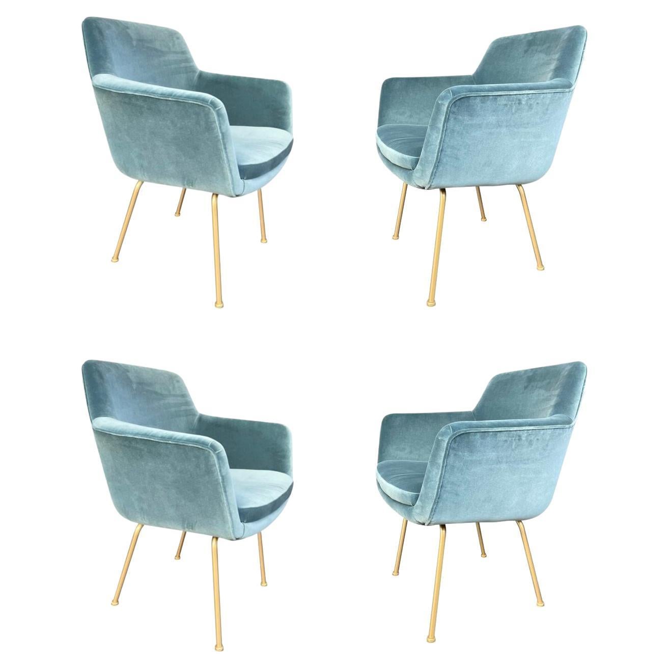 A set of four Italian 1970s chairs with gilt metal legs in blue velvet fabric