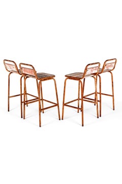 A Set of Four Italian Industrial Bar Stools