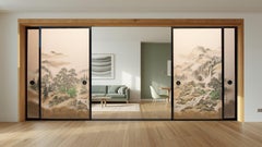 A set of four Japanese lacquered fusuma doors with a painted silk landscape