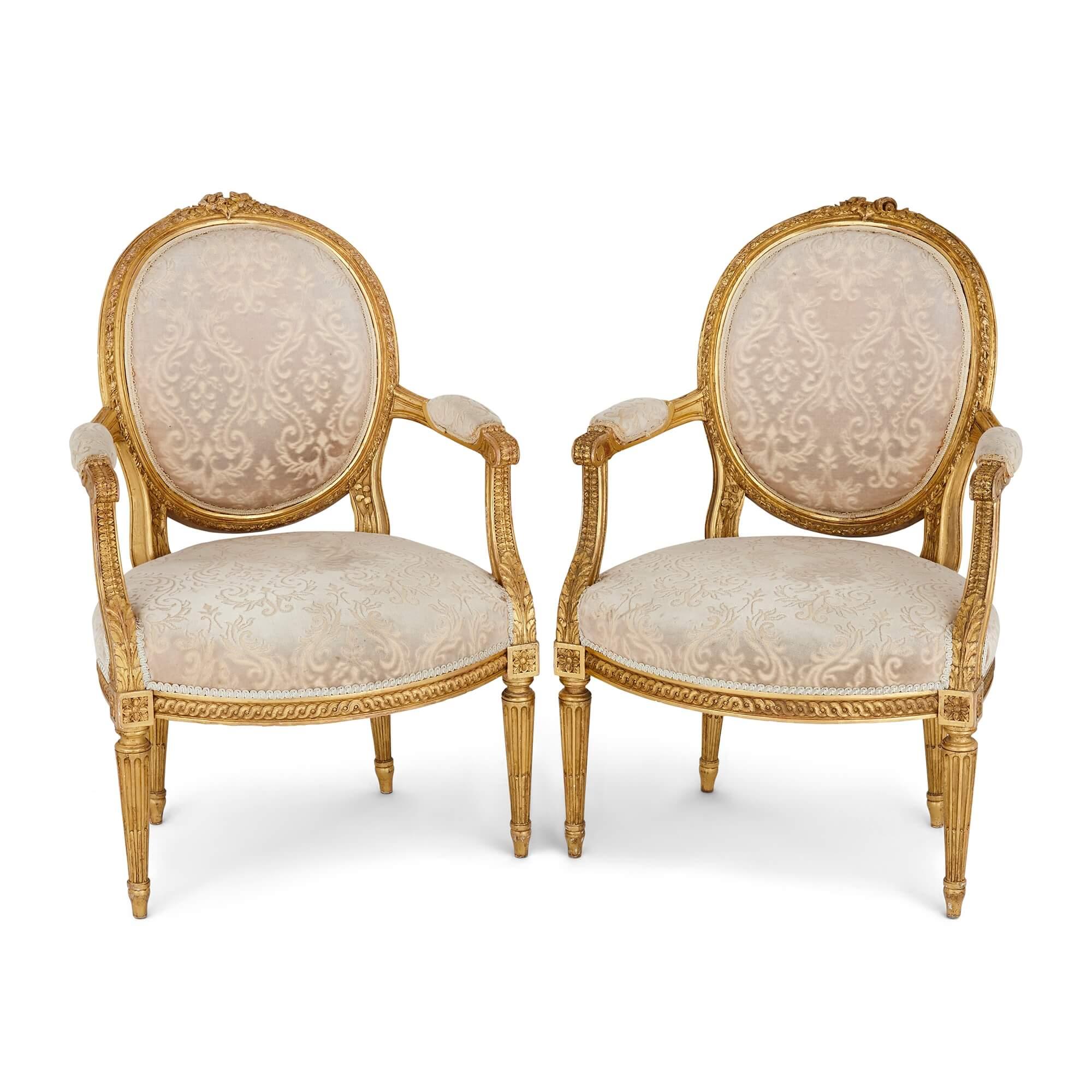 Carved Set of Four Louis XVI Style Giltwood Fauteuils For Sale