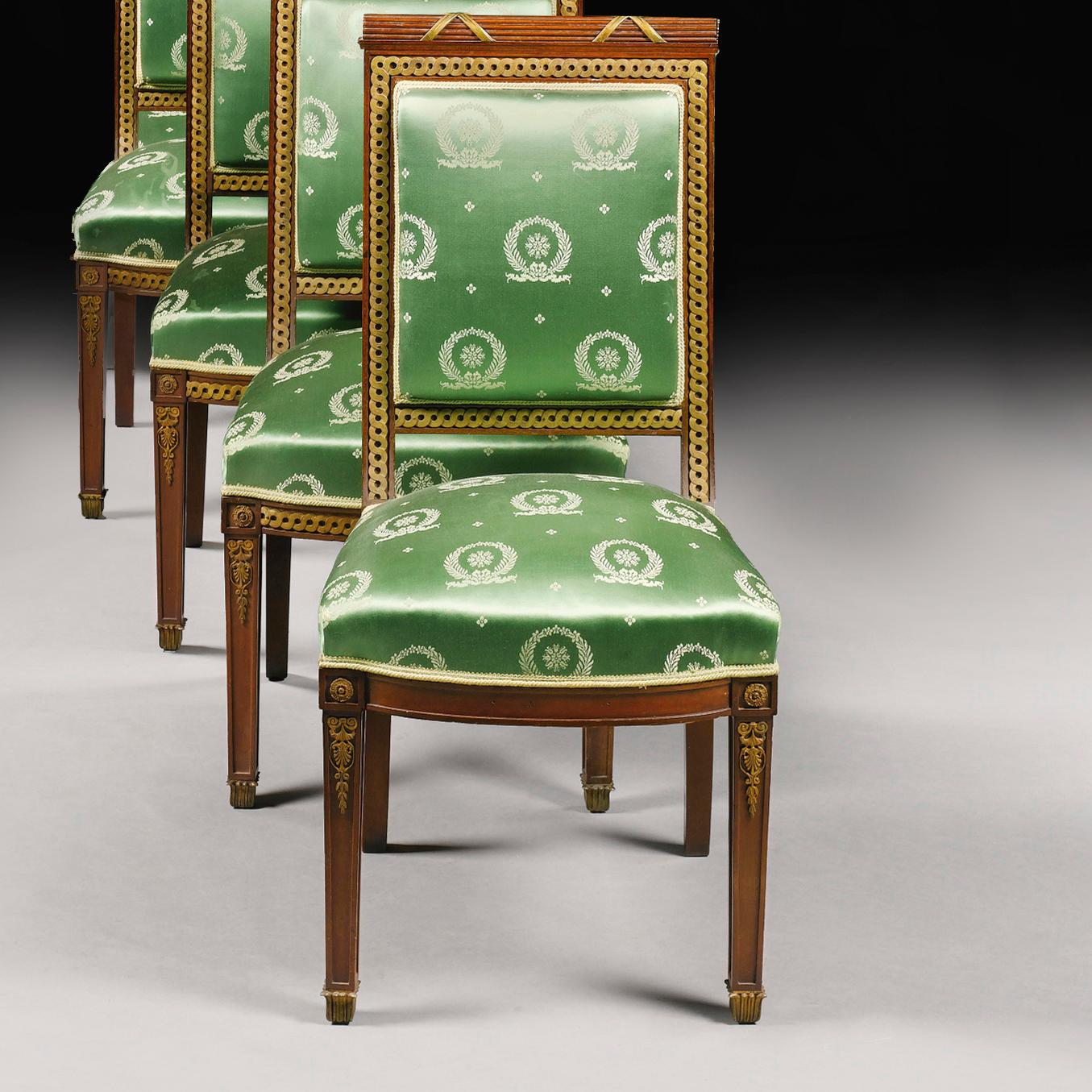 A Set of Four Mahogany And Gilt-Bronze Second Empire Salon Chairs in the Manner of Jacob-Desmalter.     

French, Circa 1880.