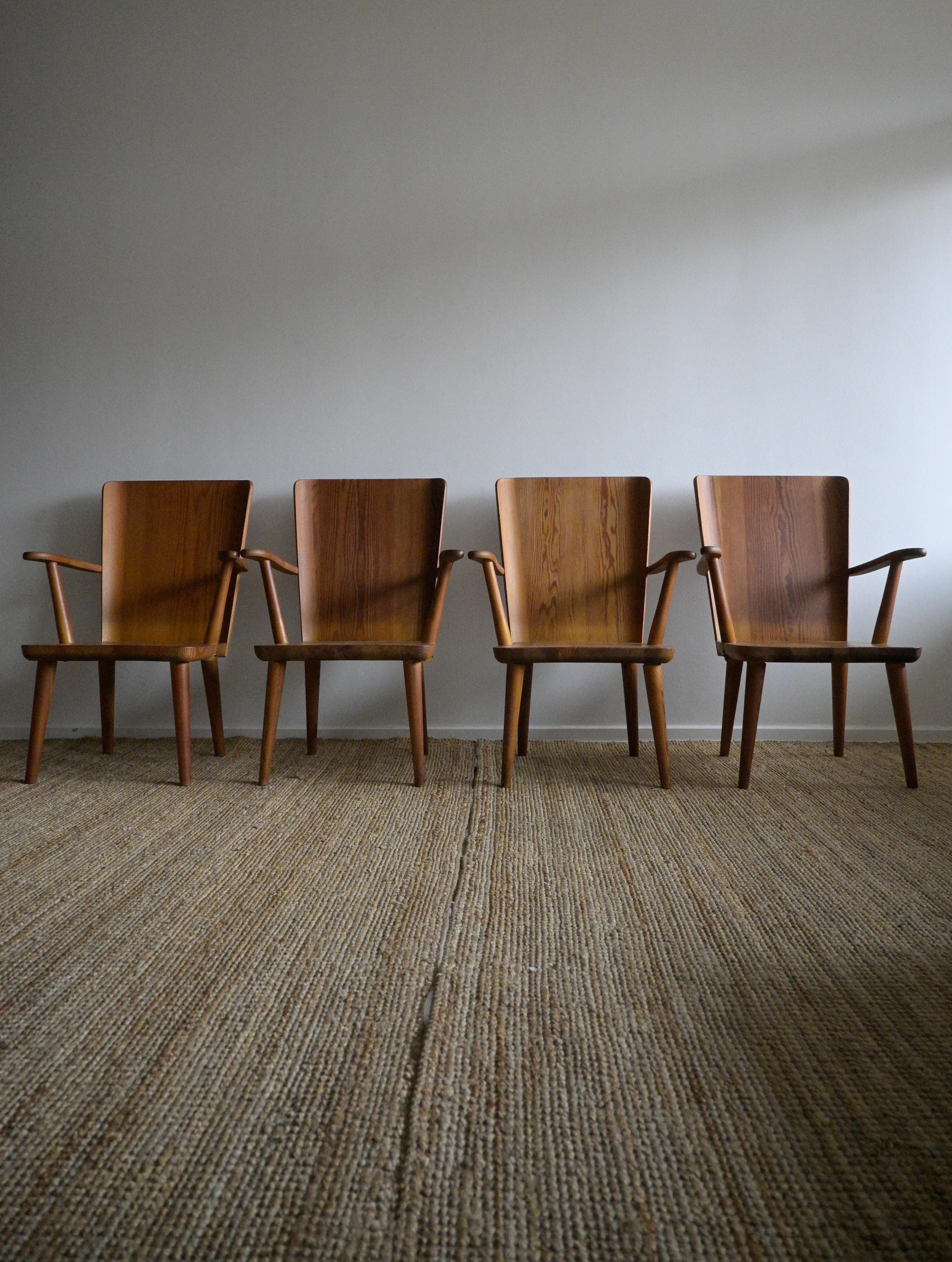 A set of four mid-century armchairs
designed by Göran Malmvall
Produced by Svensk Furu in the 1940s

Showing signs of age and use.
One chair has dry cracks on the armrests. And one has a repaire on one armrest.

Heigth: 86 cm/33.8 inch
Depth: 46