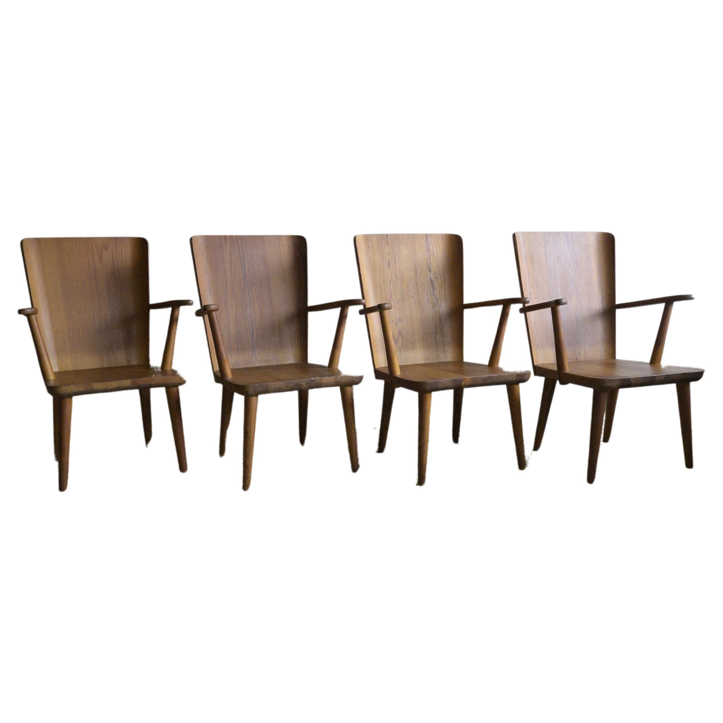 A set of four mid-century armchairs by Göran Malmvall, Svensk Furu, 1940s For Sale