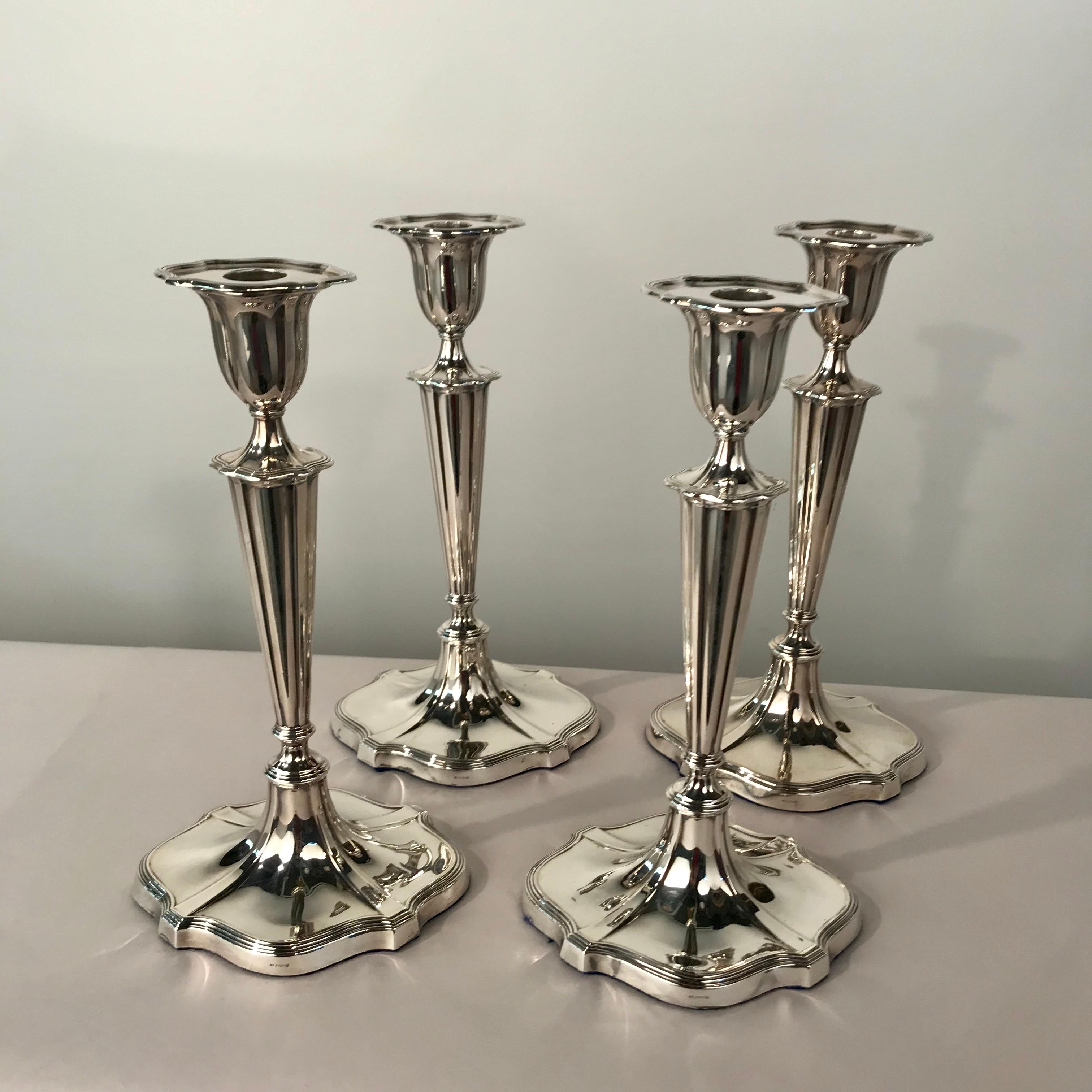 Each on an elegant shaped oval foot, with tapering stems and shaped corresponding drip pans. The overall effect of this set is extremely fine and slender. They are fully marked for London 1903 and with the makers mark for Mappin and Webb.