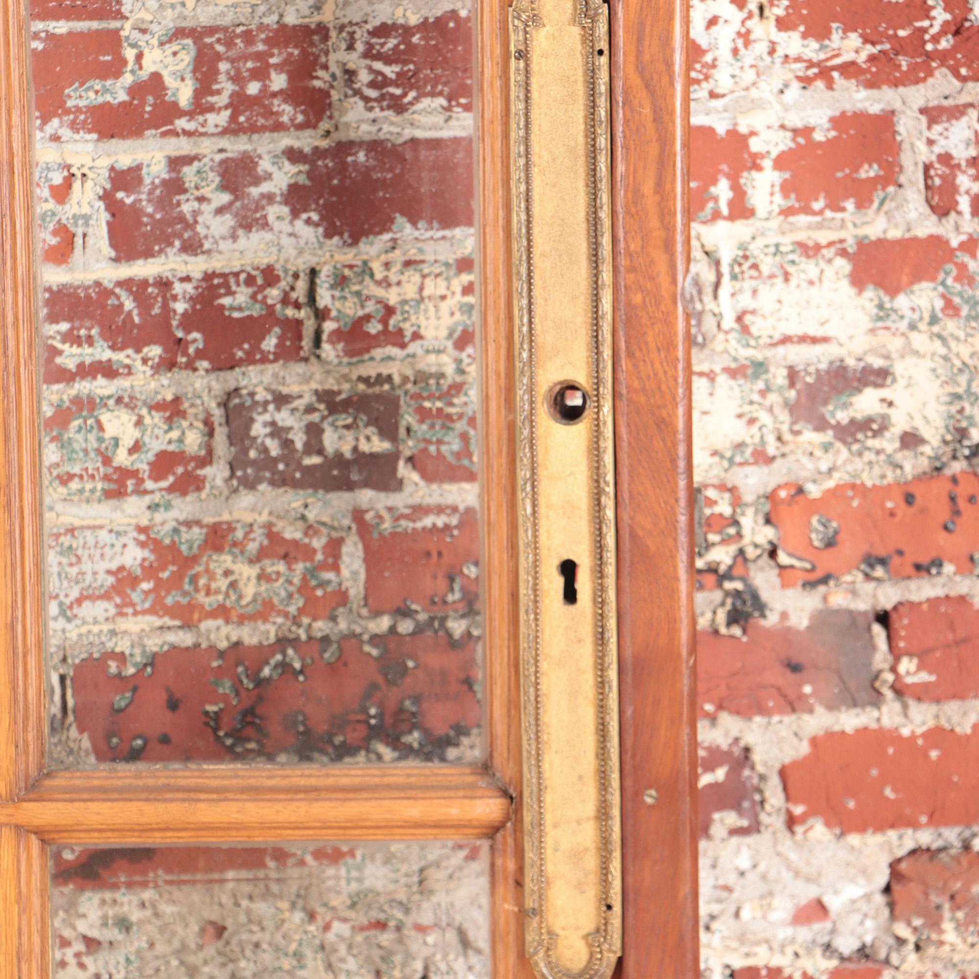 Set of Four Panel Oak Entry Doors with Beveled Glass, circa 1900 In Good Condition In Philadelphia, PA