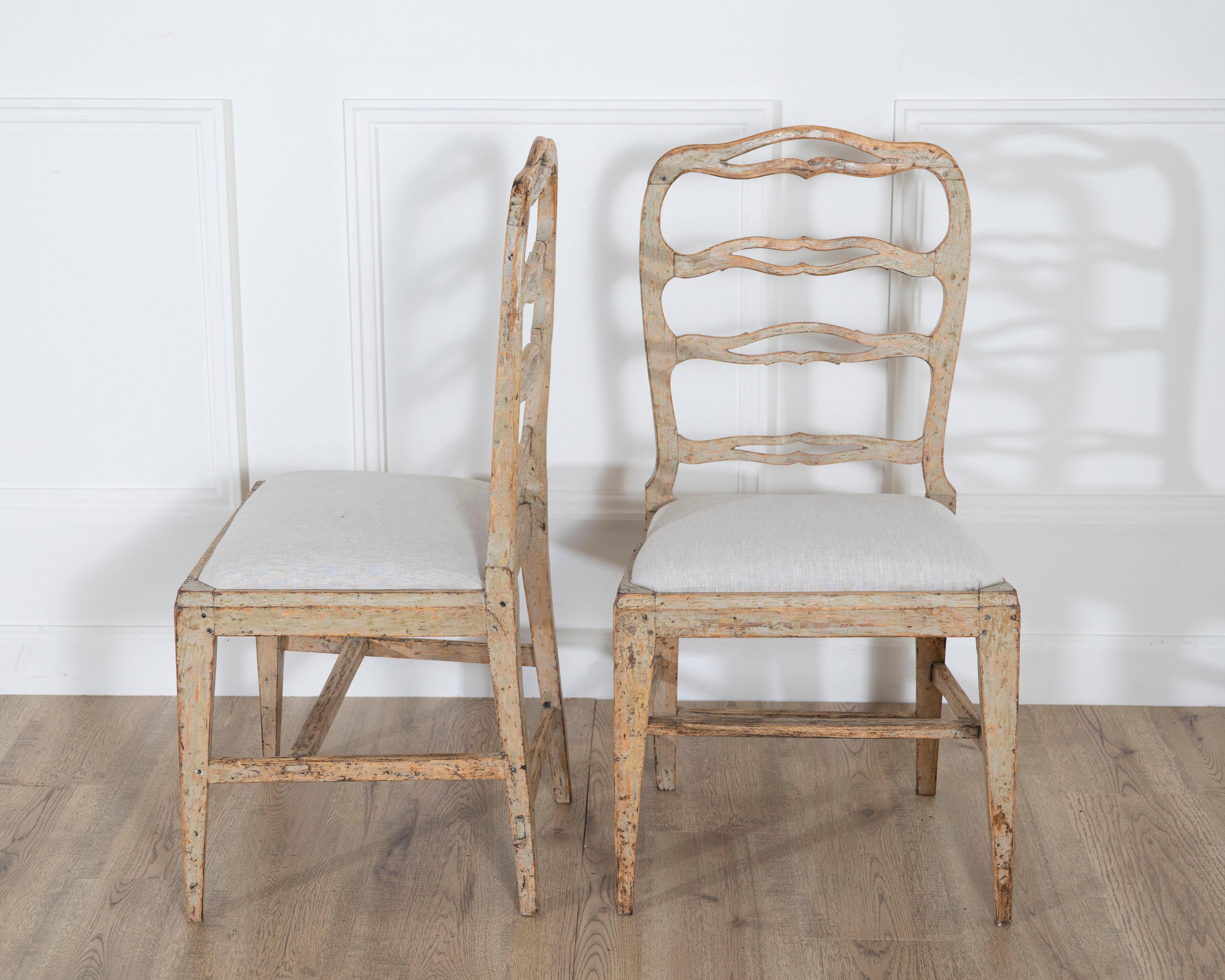 Swedish A set of four period Gustavian chairs scraped to original paint and newly covere For Sale