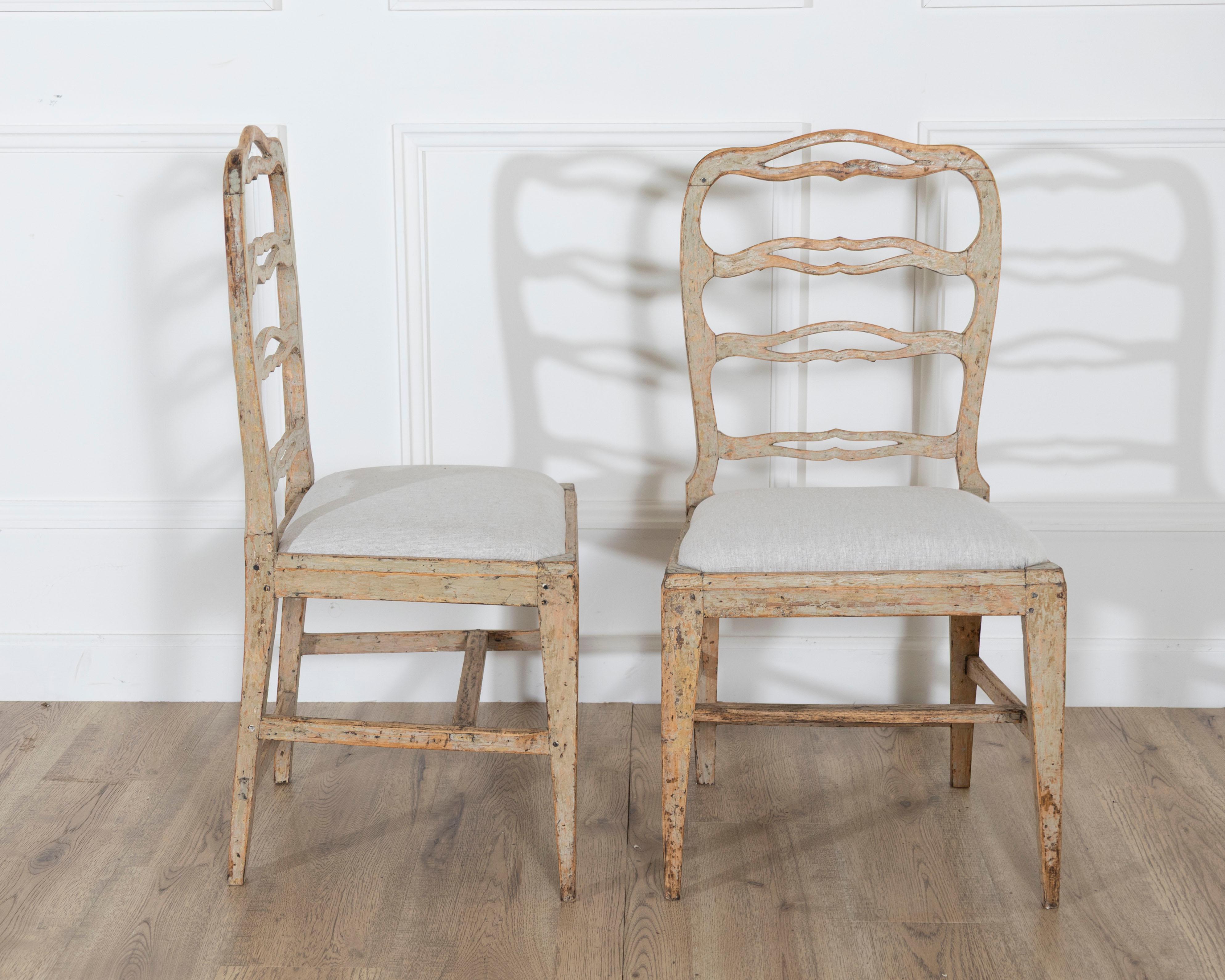 19th Century A set of four period Gustavian chairs scraped to original paint and newly covere For Sale