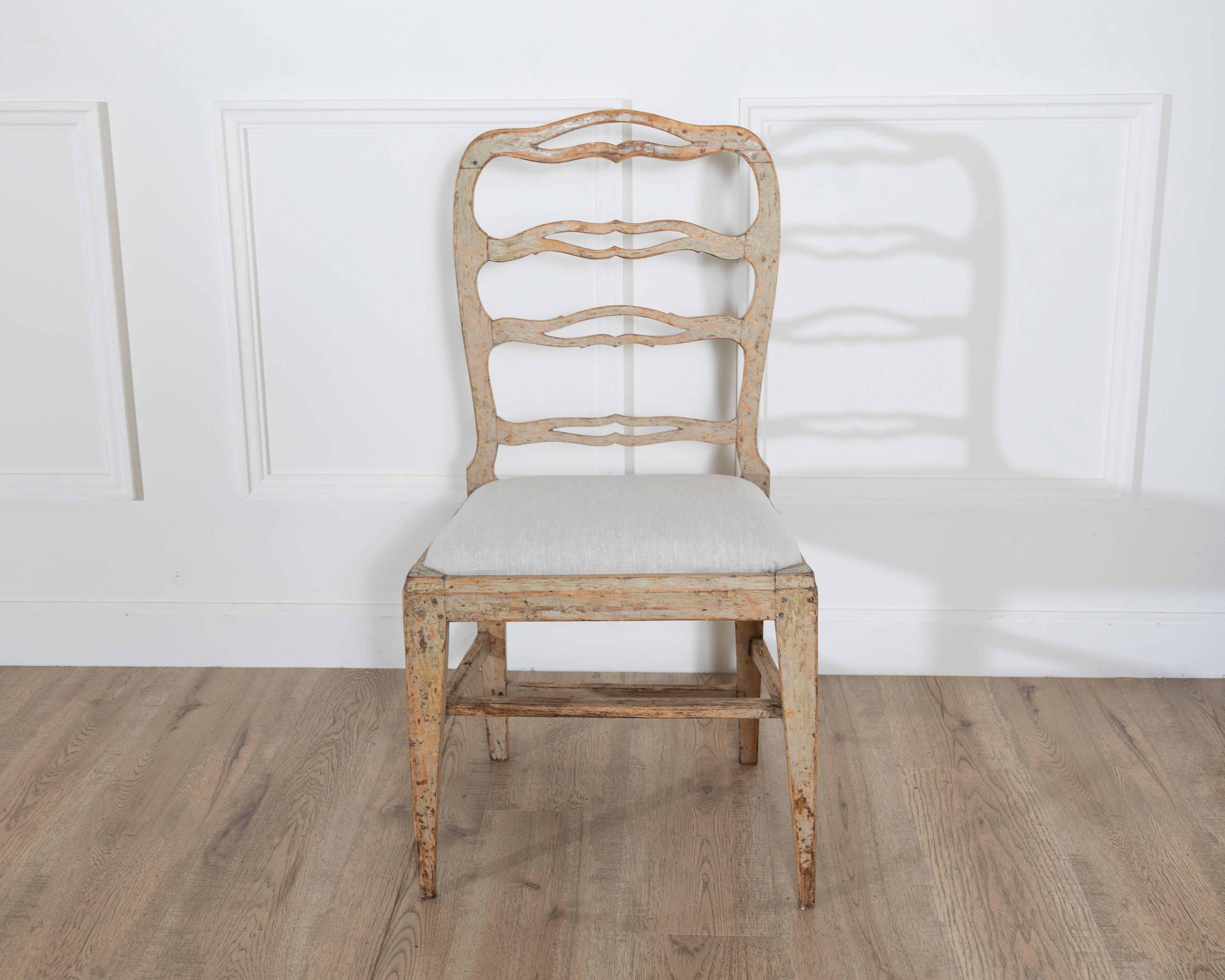 Linen A set of four period Gustavian chairs scraped to original paint and newly covere For Sale