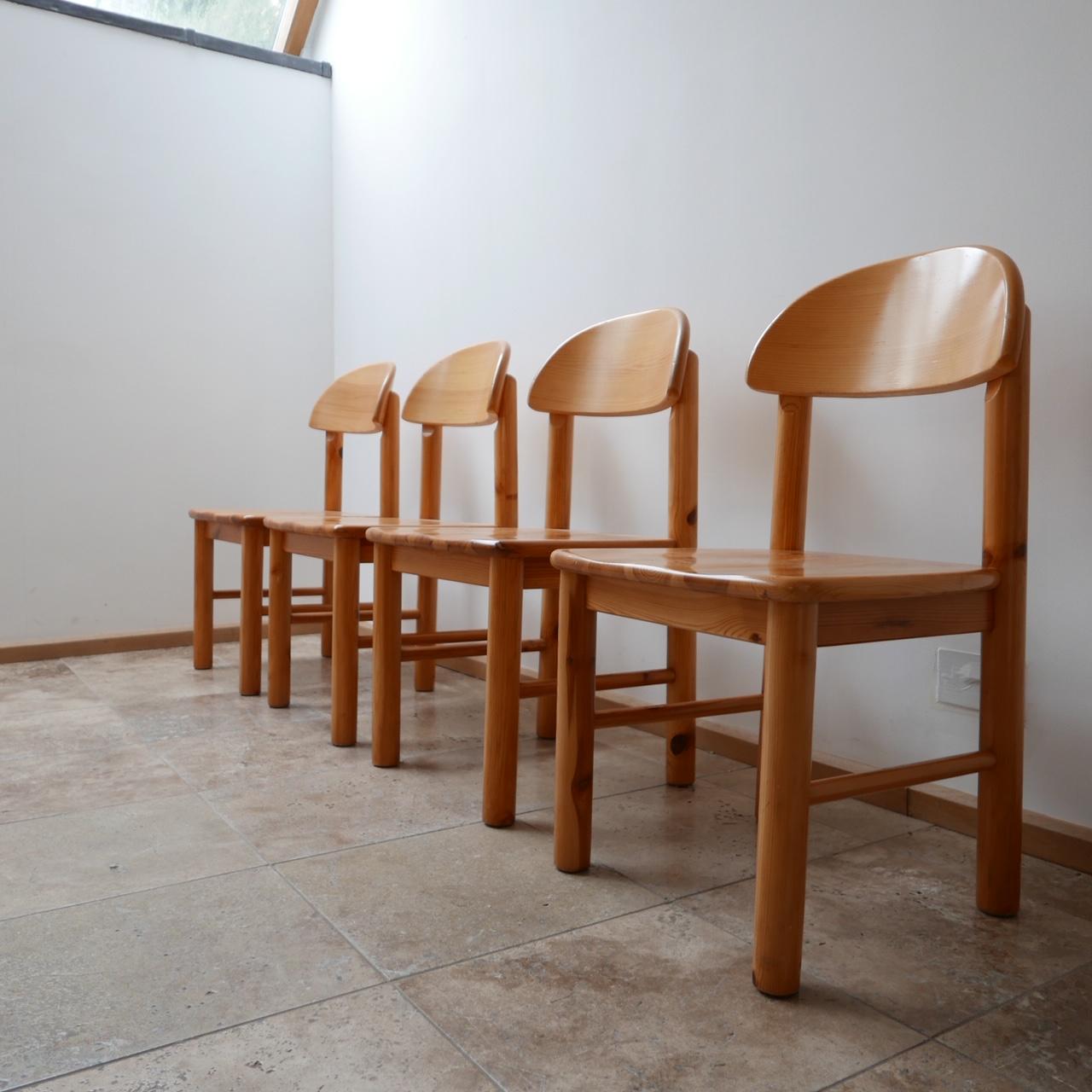 A set of four pine dining chairs,

late 20th century.

Sourced in Holland.

Good condition, some scuffs consistent with age.

Dimensions: 50 W x 45 D x 46.5 seat height x 88 total height in cm.

 