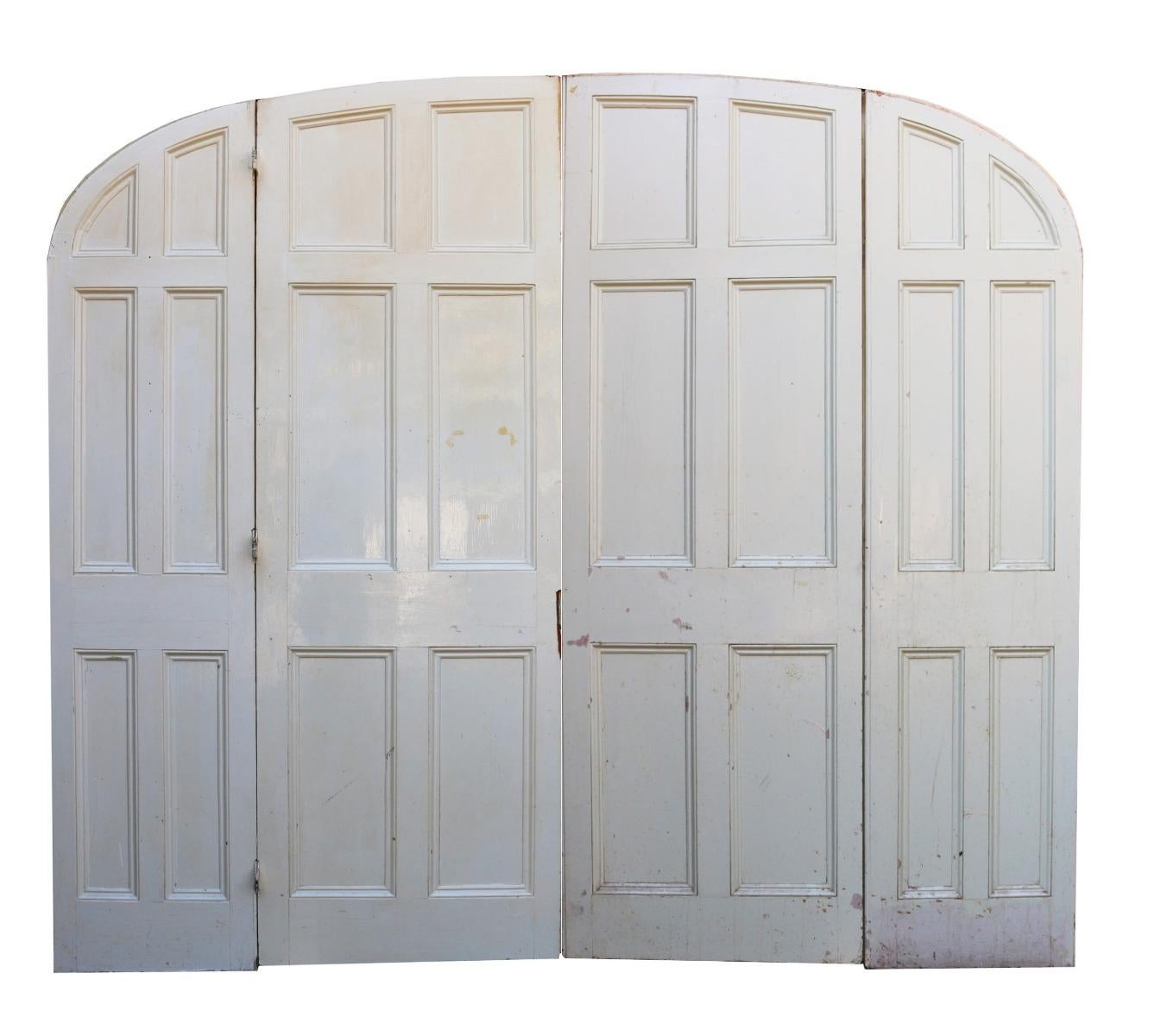 These room dividing doors were salvaged from a Victorian villa in Torquay.

Additional Dimension:

Height (Top of the arch) 241 cm

Width 281.5 cm

Thickness 4.2 cm.