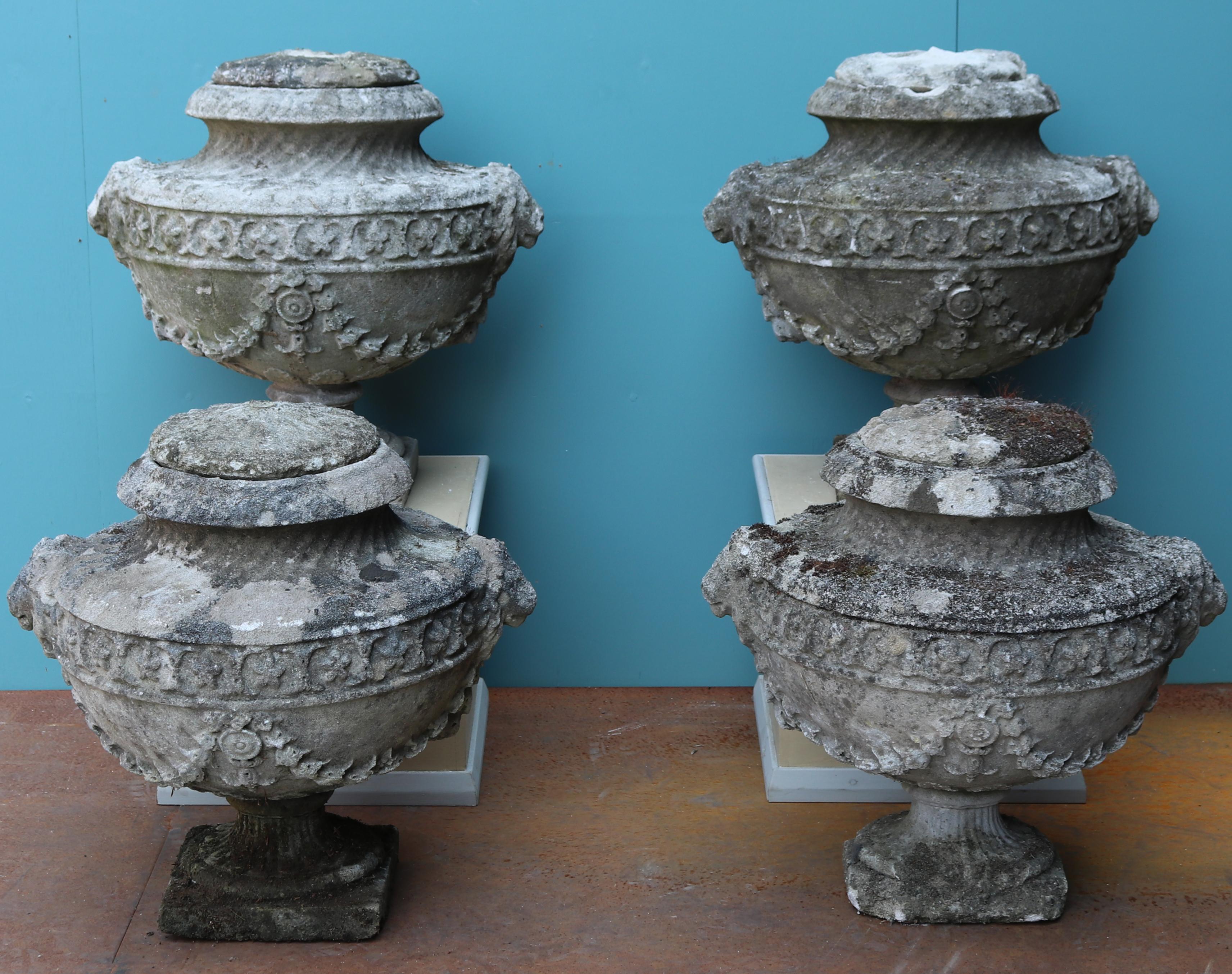 A set of four well weathered composition stone urns with swag decoration.



 

Additional dimensions 

Diameter 50 cm

Widest part 60 cm

Diameter of opening approximate 20 cm and 25 cm deep

 

 

 

 

Condition