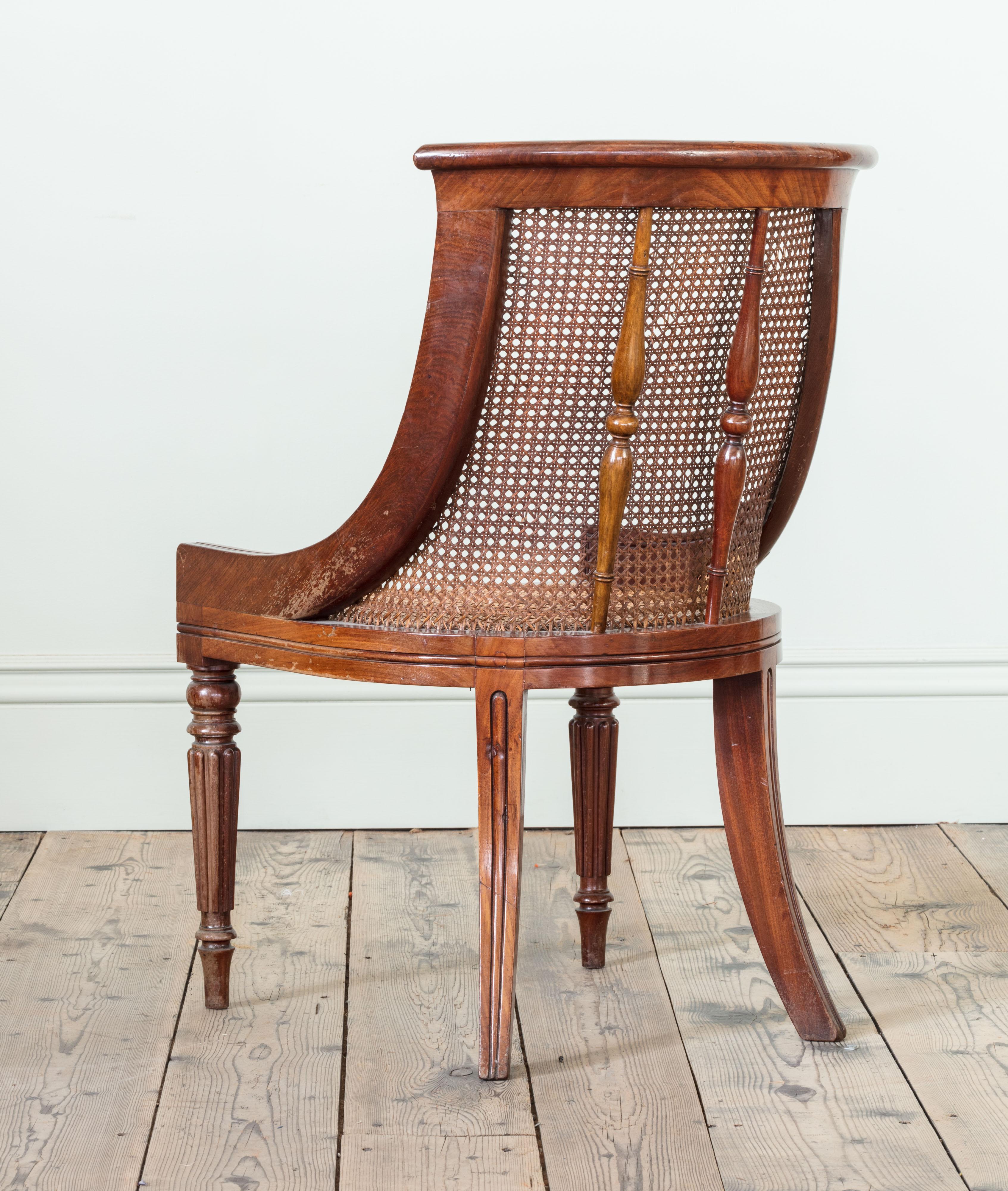 Hand-Carved Set of Four Regency Mahogany Caned Dining Chairs For Sale