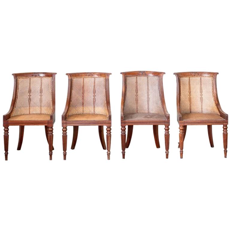 Set of Four Regency Mahogany Caned Dining Chairs