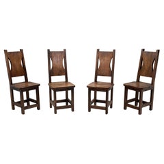 A Set of Four Stained Beech Modernist Dining Chairs, France 1950s