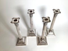 A Set of Four Sterling Silver Gorham Column Form Candlesticks