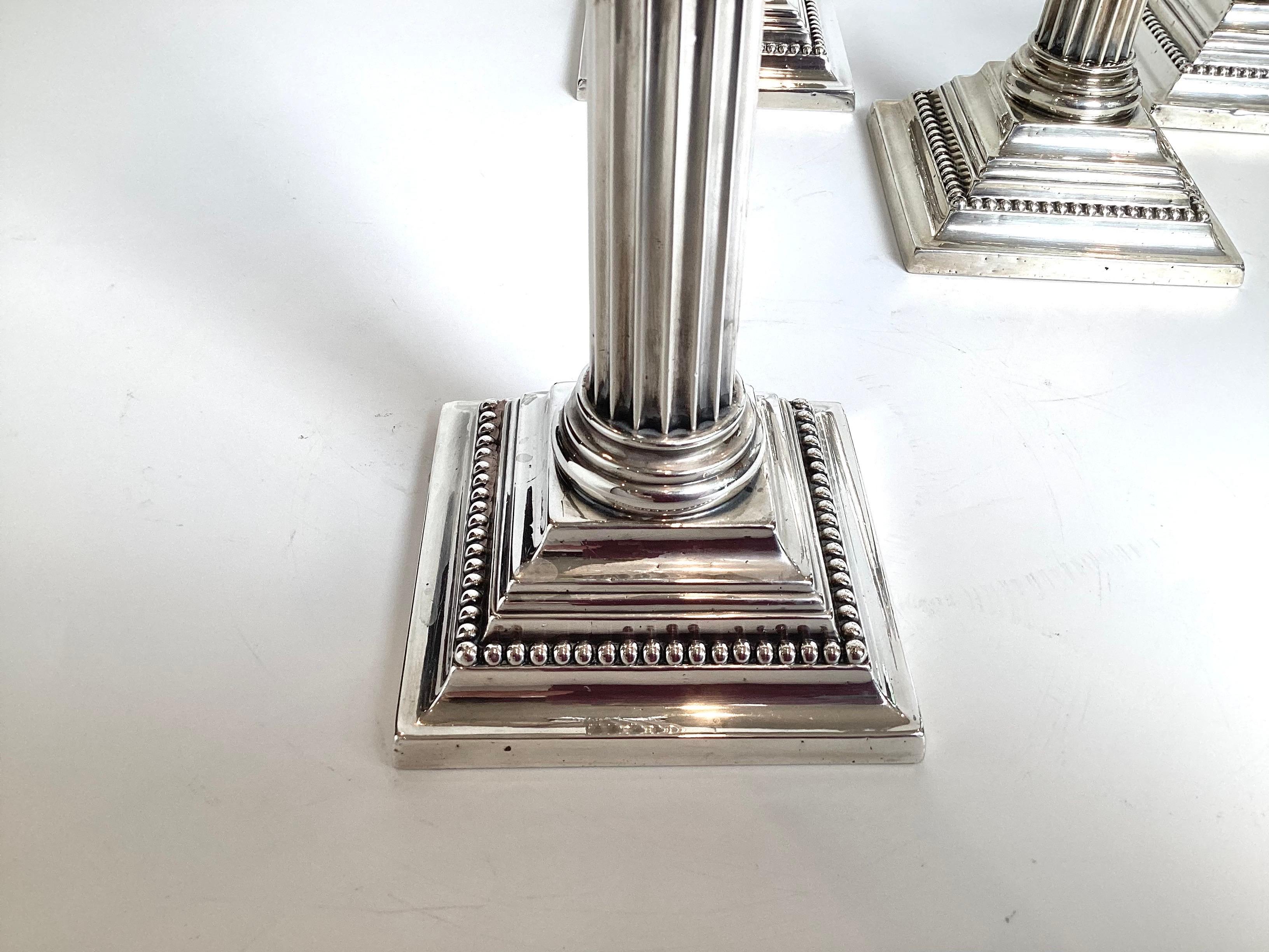 A Set of Four Sterling Silver Gorham Column Form Candlesticks In Good Condition For Sale In Lambertville, NJ