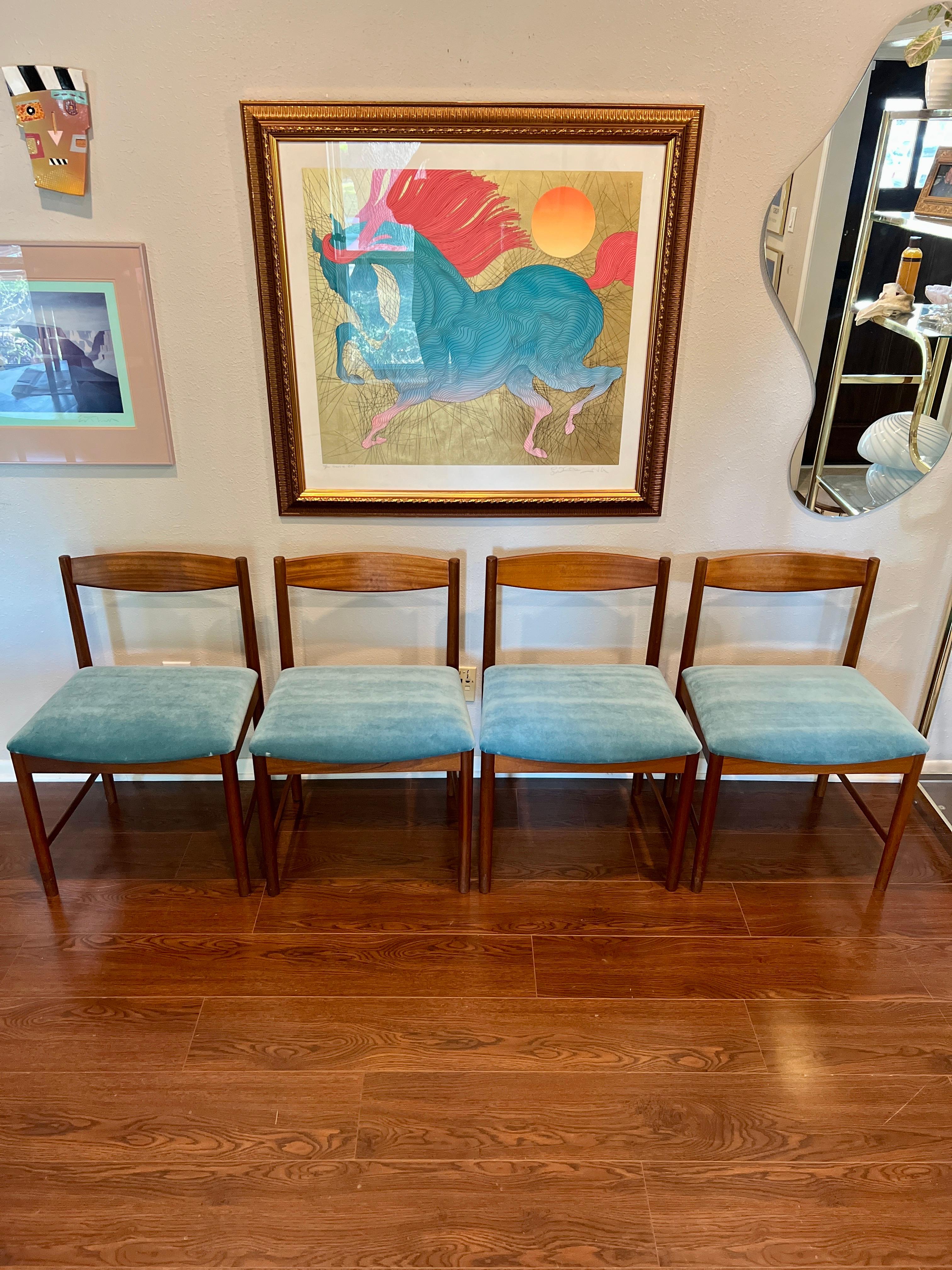 Late 20th Century A set of four teak dining chairs by Tom Robertson for A.H McIntosh blue velvet