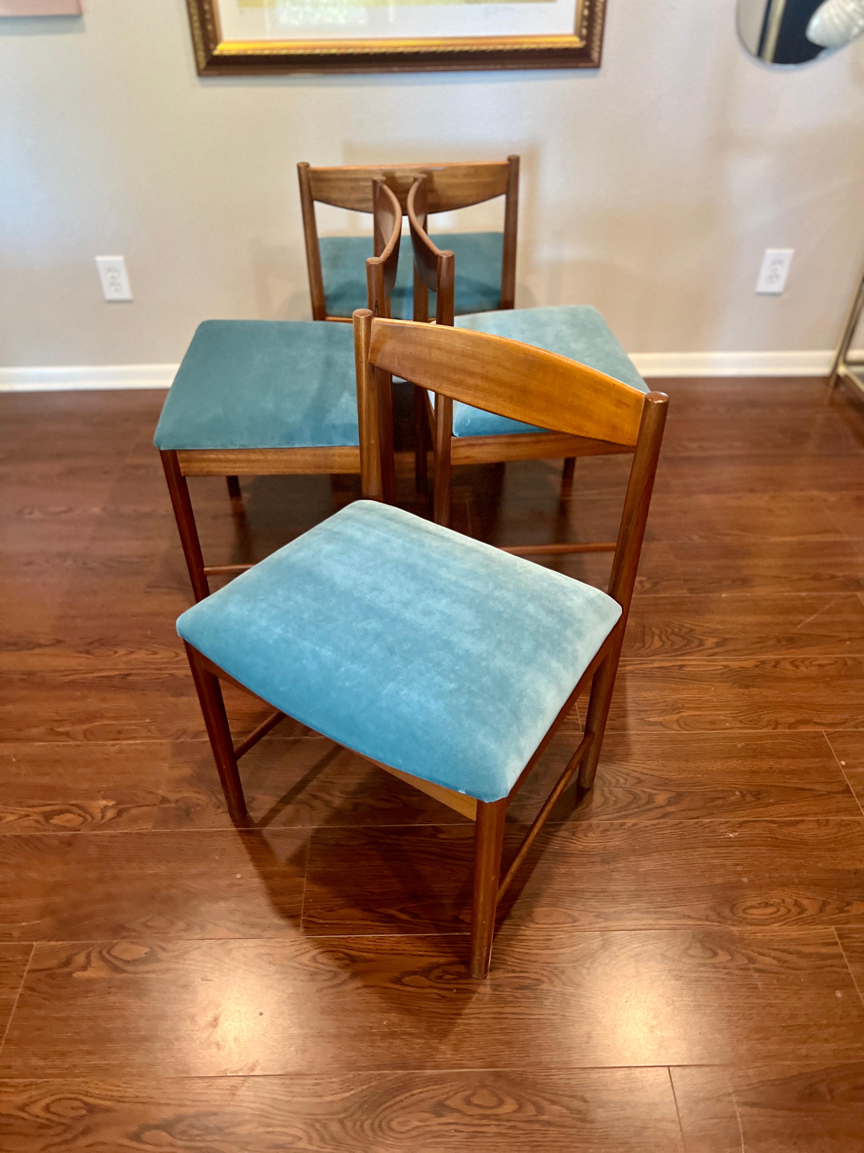 Velvet A set of four teak dining chairs by Tom Robertson for A.H McIntosh blue velvet