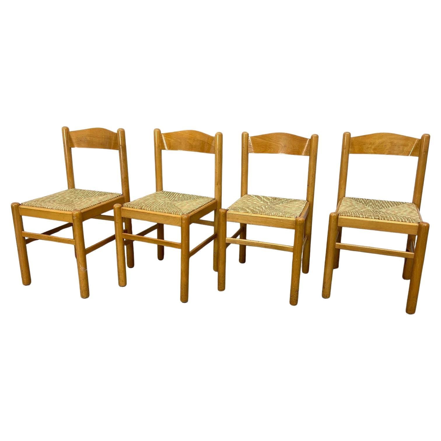 A Set of Four Vintage Rush Seat Dining Chairs
