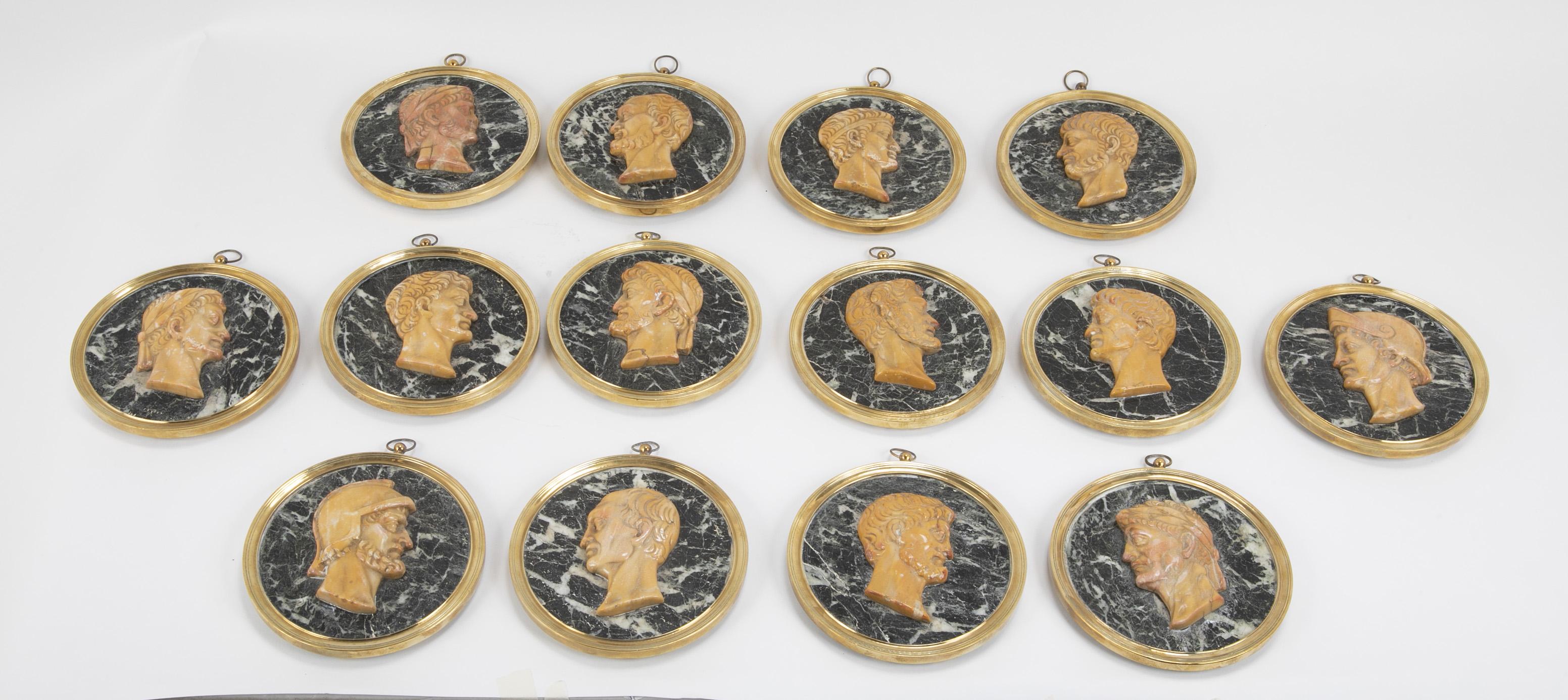 Fourteen portraits of Roman Emperors circa first quarter of the 19th century. Portraits made of Giallo di Siena marble on Verde Antiqtico Marble with later brass handmade frames.