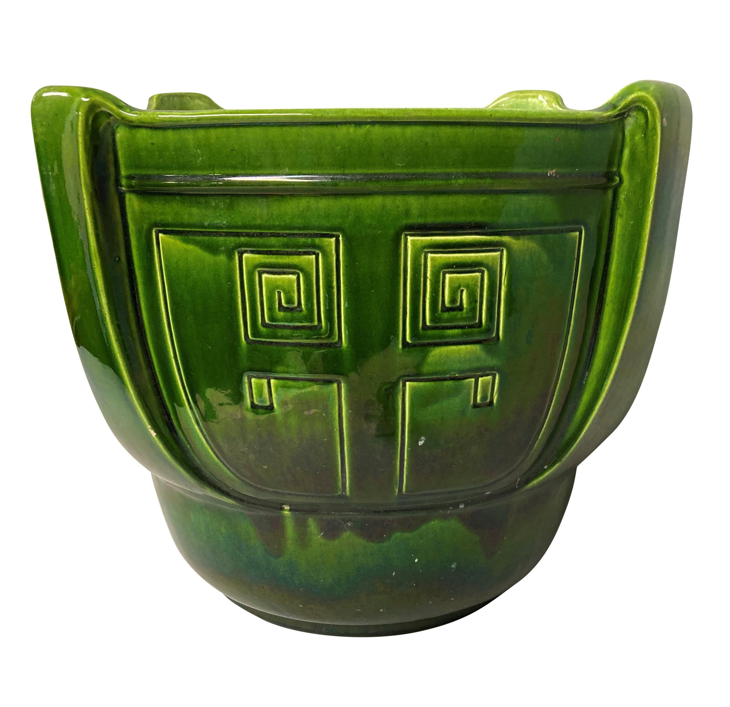 A large collection of English emerald glazed cache pot by Bretby and others. All in good condition apart from two small chips.
Measure: 43cm high x 33cm diameter (largest) 10cm high x 14cm diameter (smallest).