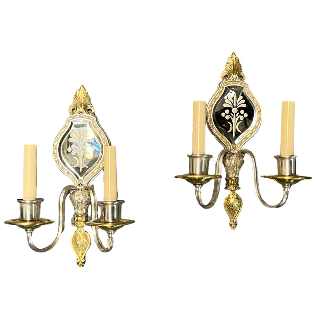 A set of six French silver plated sconces with mirror inset. Sold per pair.

Measurements:
Height: 14