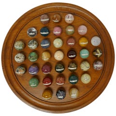 Antique Set of French Marble Orbs on a Turned Solitaire Board