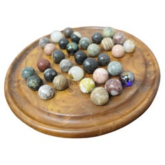 Set of French Marbles on a Turned Solitaire Board