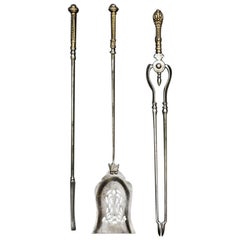 A Set of Georgian Style Brass and Steel Firetools
