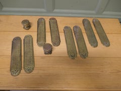 A Set of Heavy Arts and Crafts Brass Door Finger Plates and Knobs